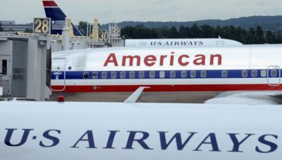 AMR Corporation - US Airways fusión se completará el 9 de diciembre
